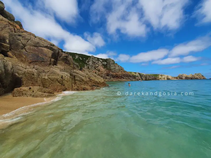 Porthcurno Beach high cliffs