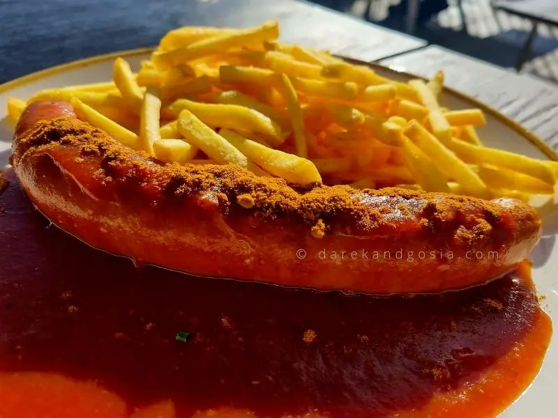 Bavarian food - traditional German cuisine - Currywurst mit Pommes